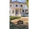Two-story home with a columned front porch located in the historic Druid Hills neighborhood at 818 Springdale Ne Rd, Atlanta, GA 30306