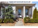 Inviting front porch with seating area and charming landscaping at 108 Brighton Blvd, Woodstock, GA 30188