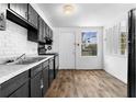 Bright kitchen features modern appliances, stylish cabinets, and hardwood floors at 3063 Kerr Dr, Decatur, GA 30034