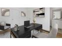 Well-lit home office with built-in desk space and stylish, modern decor at 201 New St # 2305-1, Decatur, GA 30030