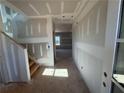 Unfinished foyer with access to stairs and several rooms allowing customization for the buyer's taste at 2108 Boxwood Circle Se, Conyers, GA 30094