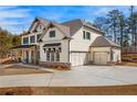 Expansive property boasts a three-car garage and beautiful architectural details at 805 Dempsey Ct, Marietta, GA 30064