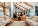 Bright living room with high ceilings, exposed beams, and elegant furnishings at 487 Glendale Ct, Stone Mountain, GA 30087