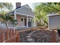 Quaint home with a covered porch, charming details, and a beautifully landscaped backyard at 371 Blake Se Ave, Atlanta, GA 30316