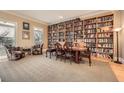 Elegant room with a full wall bookcase and seating area at 397 4Th Ne St, Atlanta, GA 30308