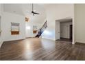 Bright living room with hardwood floors, high ceilings, and a modern ceiling fan at 1114 Oak Knoll Se Ter, Atlanta, GA 30315