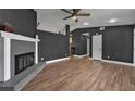 Spacious living room featuring hardwood floors and a fireplace at 10330 Wisteria Ln, Jonesboro, GA 30238