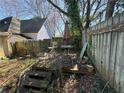 A deck in the backyard provides an inviting outdoor space for relaxation, needs renovation at 193 Berean Se Ave, Atlanta, GA 30316