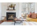 Close up of fireplace and stylish decor in the bright living room at 1323 Weatherstone Ne Way, Atlanta, GA 30324