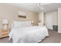 Calm main bedroom with neutral colors, plush bedding, and ample natural light at 1323 Weatherstone Ne Way, Atlanta, GA 30324