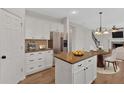 Stylish kitchen featuring stainless steel appliances, granite countertops, and an island with seating at 1235 King Springs Se Ct, Smyrna, GA 30080