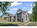 Modern designed home with manicured lawn and landscape, and gorgeous curb appeal at 372 Karen Dr, Alpharetta, GA 30009