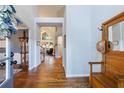 Inviting foyer featuring hardwood floors and elegant decor at 108 Ardsley Run, Canton, GA 30115