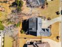 Overhead view of the home showcasing its roof, backyard and placement in neighborhood at 2885 Towne Village Dr, Duluth, GA 30097