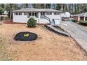 Charming white painted brick home with refreshed landscaping and new roof at 2254 Glendale Drive, Decatur, GA 30032