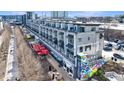 Modern condominium complex with vibrant street-level retail and walkable urban setting at 661 Auburn Ne Ave # 10, Atlanta, GA 30312