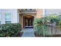 Close up of condo entrance with double doors and an Ashford-branded doormat at 222 Ashford Cir # 222, Atlanta, GA 30338