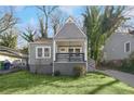 Charming home with a cozy front porch and well-maintained lawn at 2006 Conrad Se Ave, Atlanta, GA 30315