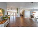 Spacious living room with hardwood floors, vaulted ceilings, and lots of natural light at 403 Flint Hill Ct, Lawrenceville, GA 30044