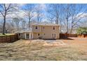 Spacious backyard with a fence, stone patio, and lush grass perfect for outdoor entertaining and Gathering fun at 4358 Stockton Way, Marietta, GA 30066