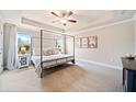 Spacious main bedroom features a trey ceiling, large windows, and neutral décor with plenty of natural light at 126 Maple Creek Way, Woodstock, GA 30188
