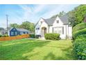 Charming home with a well-manicured lawn and attractive landscaping, creating a welcoming curb appeal at 98 Chappell Nw Rd, Atlanta, GA 30314