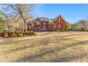 Expansive front yard with a beautiful brick home and meticulously maintained landscaping at 238 Chappell Rd, Fayetteville, GA 30215