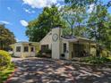 Inviting yellow brick building with covered front porch and barbecue grill at 3941 Covered Bridge Sw Rd, Smyrna, GA 30082