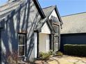 Close-up of the home's modern exterior with crisp lines and contrasting colors at 110 Roberts Rd, Suwanee, GA 30024