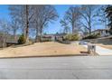 Traditional home with manicured front yard, brick mailbox post and inviting driveway at 1501 Sagamore Drive Ne Dr, Atlanta, GA 30345