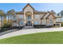 Elegant stone home with a large yard and classic curb appeal at 4434 Oglethorpe Nw Loop, Acworth, GA 30101