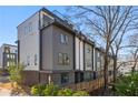 Contemporary townhome featuring a private rooftop terrace and modern design at 1836 Memorial Dr # 303, Atlanta, GA 30317