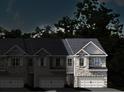 The new townhomes feature charming brick and stone exteriors with private garages and professional landscaping at 3071 Greyton Dr, Buford, GA 30519
