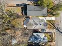 An aerial view of the home, roof and surrounding neighborhood at 1446 Metropolitan Se Ave, Atlanta, GA 30316