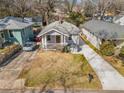 An aerial view of the home, driveway, and surrounding neighborhood at 1446 Metropolitan Se Ave, Atlanta, GA 30316
