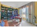Cozy office space with built-in bookshelves and a large window at 101 Fair Oaks Cir, Stockbridge, GA 30281
