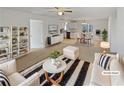 Bright living room with modern furniture, decor, and adjacent dining area at 3103 Mote Rd, Covington, GA 30016
