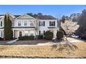 Beautiful two-story townhome with manicured landscaping, a blossoming tree, and a well-maintained front yard at 3525 Parc Sw Cir, Atlanta, GA 30311