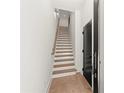 Bright entryway with a wooden staircase and minimalist design at 2327 Mason Dr # D23, Atlanta, GA 30316