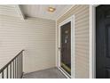 Close-up of the home's front door with clean lines and a welcoming entrance at 404 Ridgefield Dr, Peachtree City, GA 30269