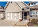 Inviting home exterior features a two-car garage and attractive stone detailing at 312 Overview Dr, Canton, GA 30114