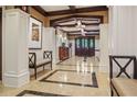 Well-lit lobby with tiled floors, elegant seating, and decorative wood trim creates a warm, inviting space at 1717 N Decatur Ne Rd # 322, Atlanta, GA 30307