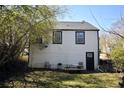 The rear of the home features a small back yard, picnic table, and a door to enter at 232 Mathewson Sw Pl, Atlanta, GA 30314