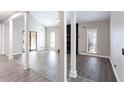 Open living room with neutral paint, abundant natural light and luxury vinyl plank flooring at 5199 Mainstreet Park Dr, Stone Mountain, GA 30088