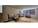 Comfortable seating and dining area with lots of light and neutral decor at 2965 Pharr Court South Nw # 316, Atlanta, GA 30305