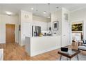 Spacious kitchen with stainless steel appliances and an open view of the bedroom at 384 Ralph Mcgill Ne Blvd # 314, Atlanta, GA 30312