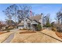 Well-manicured lawn and walkway to the front door enhance the curb appeal of this inviting home at 2109 Rugby St, Atlanta, GA 30309