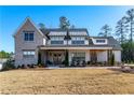 Stunning two-story home with a welcoming front porch and manicured lawn at 39 Telfair Ct, Acworth, GA 30101