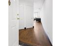 Entryway with hardwood floors leading into a bright living space, showcasing the home's inviting entrance at 1501 Clairmont Rd # 1027, Decatur, GA 30033