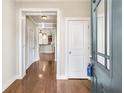 Welcoming foyer with gleaming hardwood floors and an open view into the living spaces at 1100 N North Village Drive Dr, Decatur, GA 30032